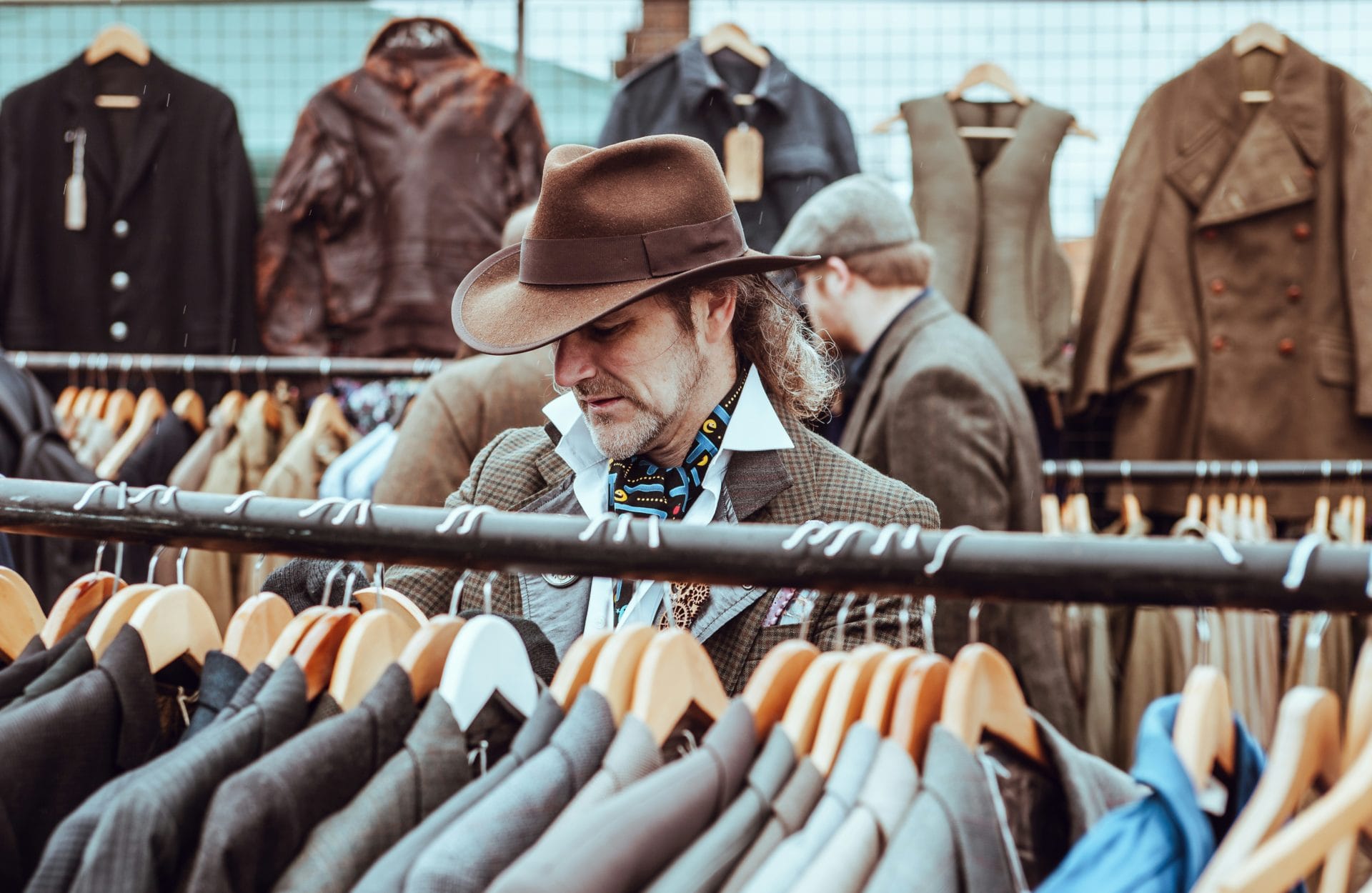 Man in cowboy hat shopping